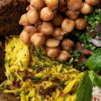 Falafel Mezza Platter · falafel balls, hummus, chickpeas salad, tabbouleh, Israeli's salad, pickles, hot sauce. 2 fr...
