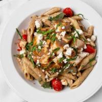 Mediterranean Pasta Salad · Penne pasta tossed with a creamy balsamic dressing, charred cherry tomatoes, spinach, Feta c...
