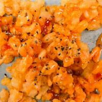 Pop Rock Shrimp · Fried shrimp with sesame seasoning, spicy mayo, and sweet chili sauce