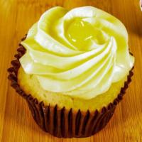 Lemon Drop · Our vanilla bean cake filled with a tart lemon filling and iced with lemon buttercream.