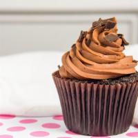 Choco-Maniac Cupcake · Our moist chocolate cake chocolate topped with smooth chocolate buttercream swirl and mini s...