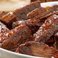 Bbq Short Rib W/ 2 Sides · Slow braised short ribs in a delicious citrus bbq sauce.