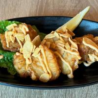 Karaage · Japanese fried chicken
choice of:
 Tokyo style: Spicy mayo and garlic chips
Miami style: Chi...