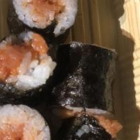 Salmon Sushi · Raw. A piece of Salmon nigiri. The FDA advises that consuming raw or uncooked meats, poultry...