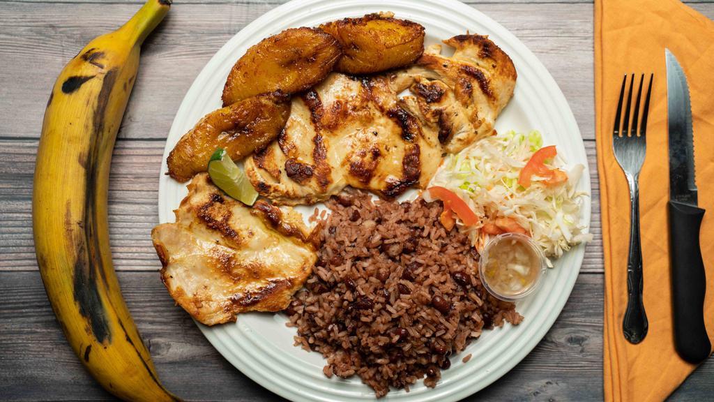 Pechuga De Pollo · Marinated grilled chicken breast served with your choice of rice, coleslaw, and one side.