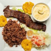 Punta De Filete En Salsa Jalapeno · Beef Tip Filet served with creamy jalapeno sauce, your choice of rice, coleslaw, and one side.