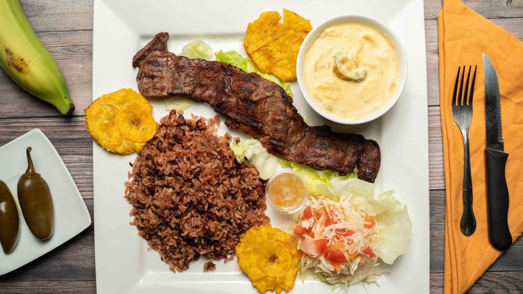 Punta De Filete En Salsa Jalapeno · Beef Tip Filet served with creamy jalapeno sauce, your choice of rice, coleslaw, and one side.