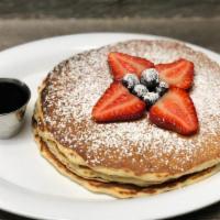 Pancakes (Full Stack 3) · 3 pancakes topped with fresh berries, powdered sugar, maple syrup
