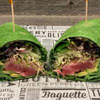 Surfside Seared Tuna Wrap · spinach wrap, rare ahi tuna, avocado, cucumbers, sprouts, spring greens, ginger wasabi mayo