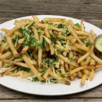 Truffle Fries · classic fries, tossed with truffle oil, fresh herbs & parmesan