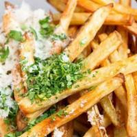 Parmesan Fries · Classic seasoned hand cut fries topped with grated Parmesan.