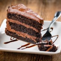 Chocolate Cake · A slice of moist and rich frosted chocolate cake. 420 cal.