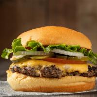 The Juicy Smashed Burger · Potato Bun, 4 Oz Black Angus Meat, American Cheese, Farm-Fresh Lettuce, Tomatoes, Pickles, O...