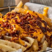 Loaded Fries · Regular Fries with Melted Cheddar Cheese & Crispy Bacon.