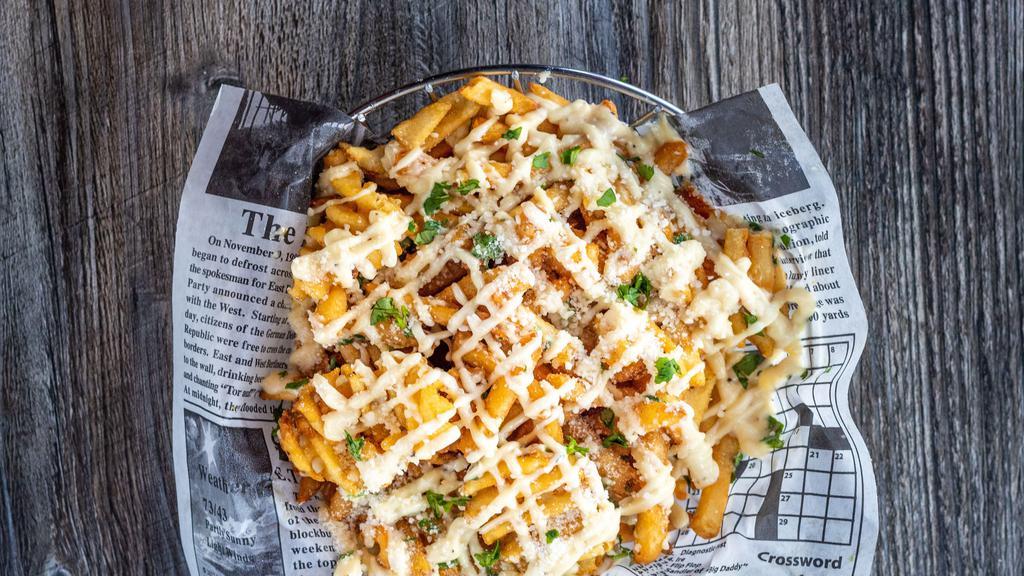 Double Truffle Fries · Crispy Fries with our signature Truffle Sauce.