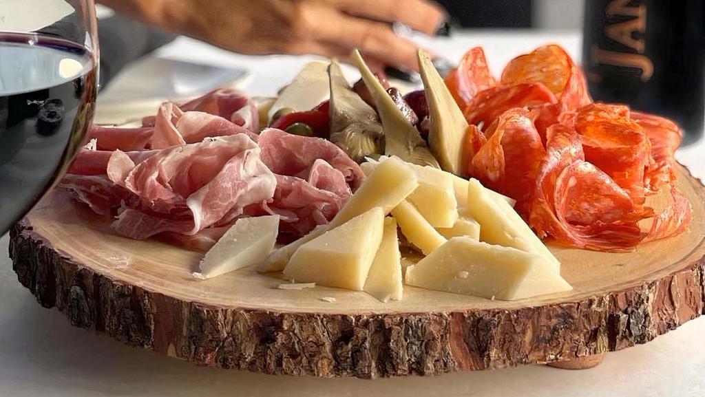 Charcuterie Board · Salumi, artisanal, cheese, olives
