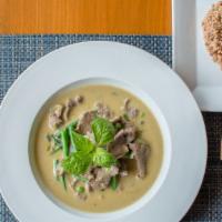 Green Curry · Spicy, green curry with Thai eggplant, peas, and basil.