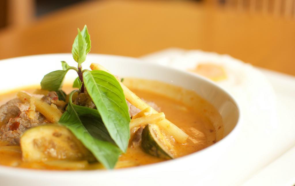 Red Curry · Spicy, red curry with Thai eggplant, basil and bamboo shoots.