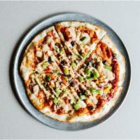 Southwest Pizza · Roasted chicken, black bean and corn salsa, roasted onions, peppers, pepper jack and spicy m...