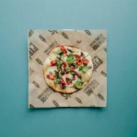 Sun & Shade Snack Pizza · Sundried tomatoes, mushrooms, and mozzarella on an alfredo sauce base. Finished with fresh b...