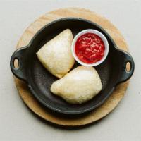 Yeast Rolls* · Dough rolls made fresh daily and served hot with a side of marinara