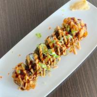 Godzilla Roll · Spicy tuna, kani and avocado deep fried and topped with eel sauce.