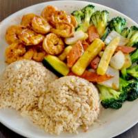 Hibachi Shrimp · Served with cabbage and fried rice with two sauces.