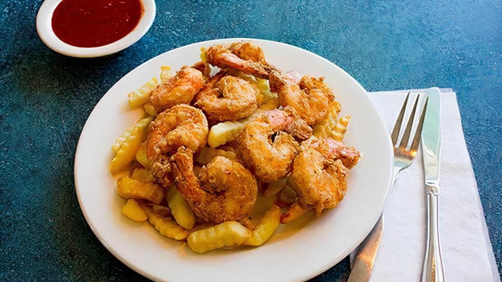Fried Jumbo Shrimp · Served with tarter sauce, rice pilaf and mixed vegetables.
