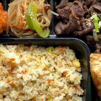 B1 Dosirak · Fried Rice, Bulgogi, Mandu, Chicken Nuggets and Japchae.