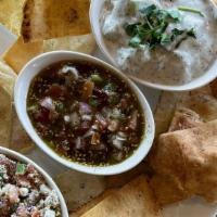 Kush Dip Trio · A platter of Fresh Pita Chips to dip into our Mediterranean Bruschetta, Kush Salsa, and Home...