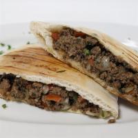 Egyptian Empanadas · Ground beef with tomatoes, onions, cilantro, jalapeño, garlic, olive oil baked in a pita bre...