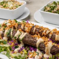 Lamb Kofta Kebah Platter · Ground lamb, onion, garlic, and middle eastern spices, served with served with tzatziki sauc...