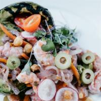 Grilled Stuffed Avocado · Shrimp escabeche, green olives, red radishes, grape tomatoes.