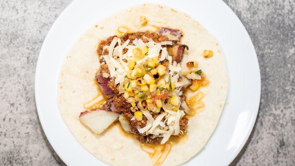 Meat N' Potato Taco · Spicy ground beef 