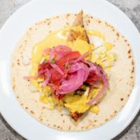 Flying Fish Taco · Today's catch, a la plancha, with shaved cabbage, aji Amarillo, Salsa Criolla.
Consuming raw...