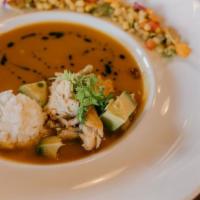Pollo De Sopa · Peruvian chicken soup, shredded roasted chicken, jasmine rice, avocado, chive oil, cilantro ...