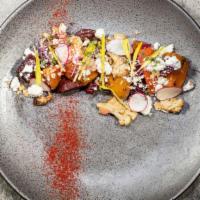 Grilled Beet Salad · Grilled romaine hearts, roma tomatoes, red radish, goat cheese crumbles, roasted cauliflower...