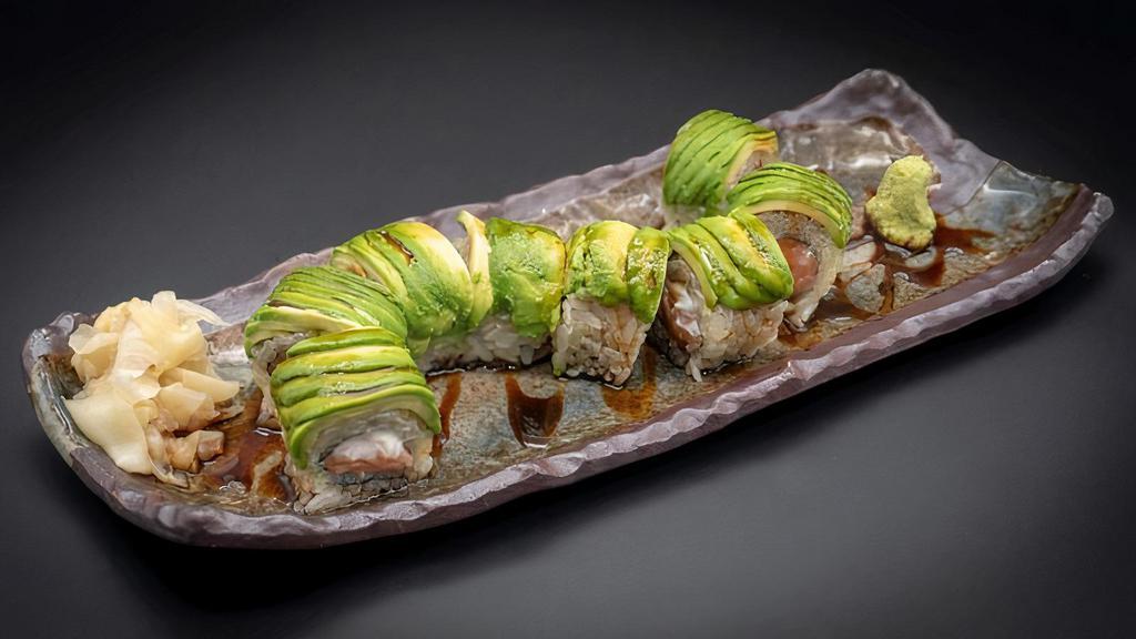 Dragon Roll · Shrimp tempura, salmon, avocado and unagi sauce.