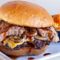 Brisket Burger · 1/3 lb Custom Ground Beef Patty with Melted American Cheese, Grilled Onions, and Topped with...