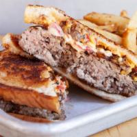 Southern Paddy Melt · Our version of a classic patty melt with a southern twist. Brushed with sweet Dixie sauce an...