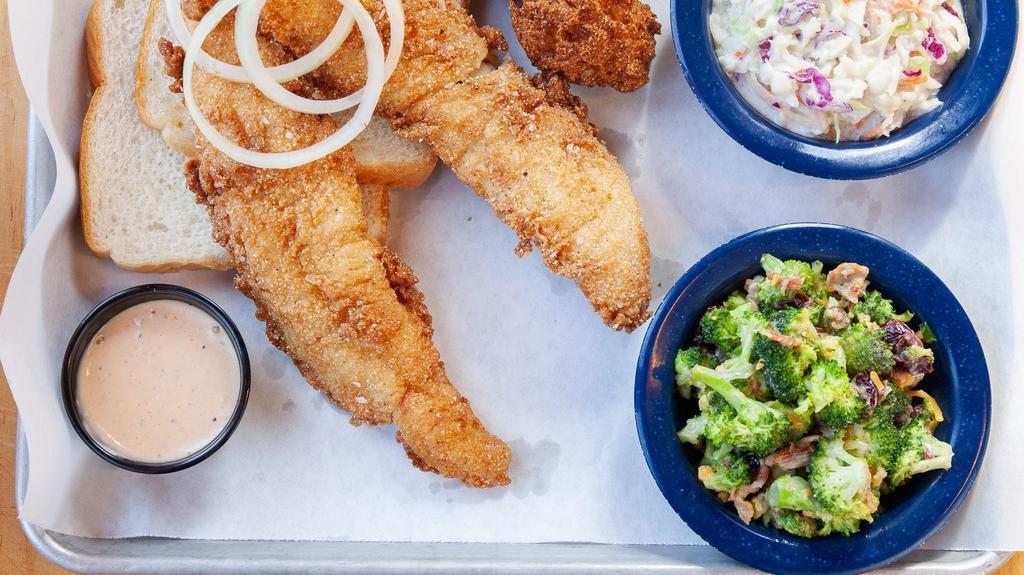 Fried Catfish Fillets · Two Mississippi Farm Raised Catfish Fillets with Onions. Served with White Bread, Two Hushpuppies and our Mississippi Comeback sauce.