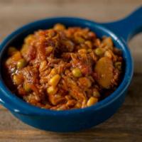 Cup Of Brunswick Stew · A traditional hearty stew with whole hog along with potatoes, tomatoes, beans, and corn.