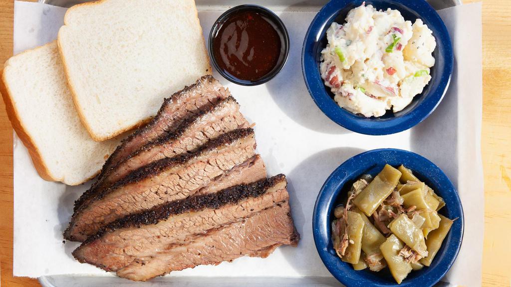 Smoked Beef Brisket Tray · Includes two sides and served with White Bread.
