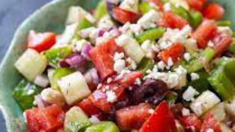 Greek Salad · Most popular. Romaine and iceberg lettuce, tomatoes, cucumbers, olives, onions stuffed grape leaf and feta cheese with Greek balsamic dressing.