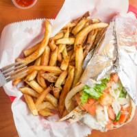 Gyro Sandwich · Shaved roast lamb and beef with lettuce, tomato, onion, and homemade tzatziki sauce.