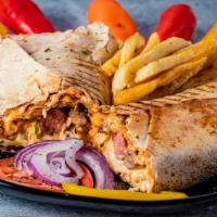 Shawarma Combo · Served with chicken & beef, 1 beef sausage. Our version of the famous shawarma will be the m...