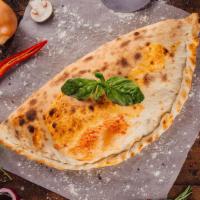 Bbq Chicken Calzone · Fresh calzone dough filled with BBQ chicken, cheese and a side of ranch sauce.