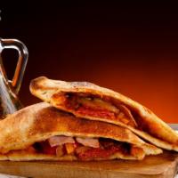 Calzone With Pepperoni, Mushrooms, And Onions · Mouthwatering 16 inch calzone stuffed with Pepperoni, Mushrooms, onions, and Ricotta and Moz...