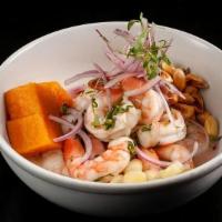 Camaron Ceviche · Peruvian style shrimp ceviche. Ají limo, onions, cilantro, choclo, camote, and Conchita.