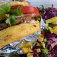 Miami Mango Tangle Burger · Vegan patty, vegan mayo, chipotle mayo, grilled onions, vegan cheese, organic spring mix tom...